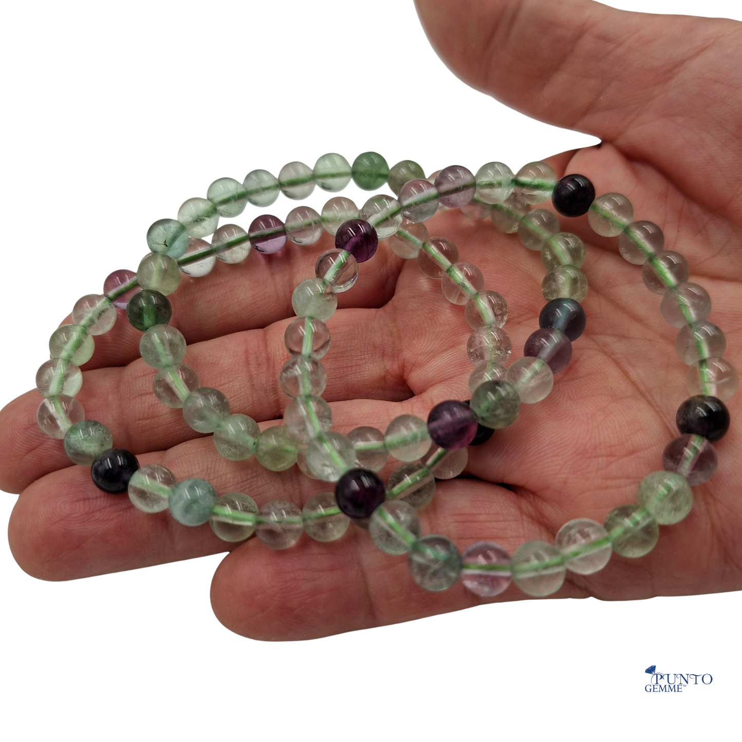 Bracciale elastico in Fluorite Multicolore Tonda Liscia , che mostra le bande di colore verde e viola.