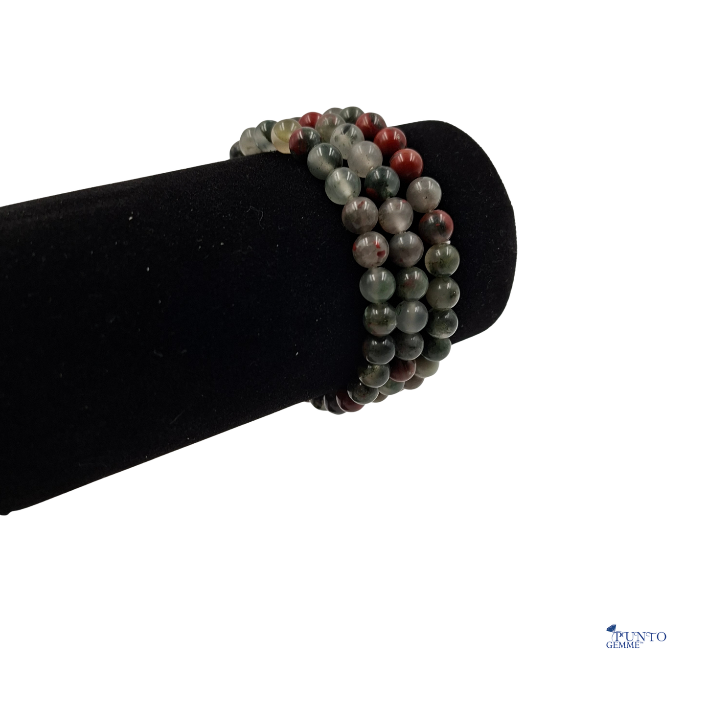 Il bracciale in Eliotropio indossato su un polso,evidenziando il contrasto del verde profondo e le macchie rosse
caratteristiche.