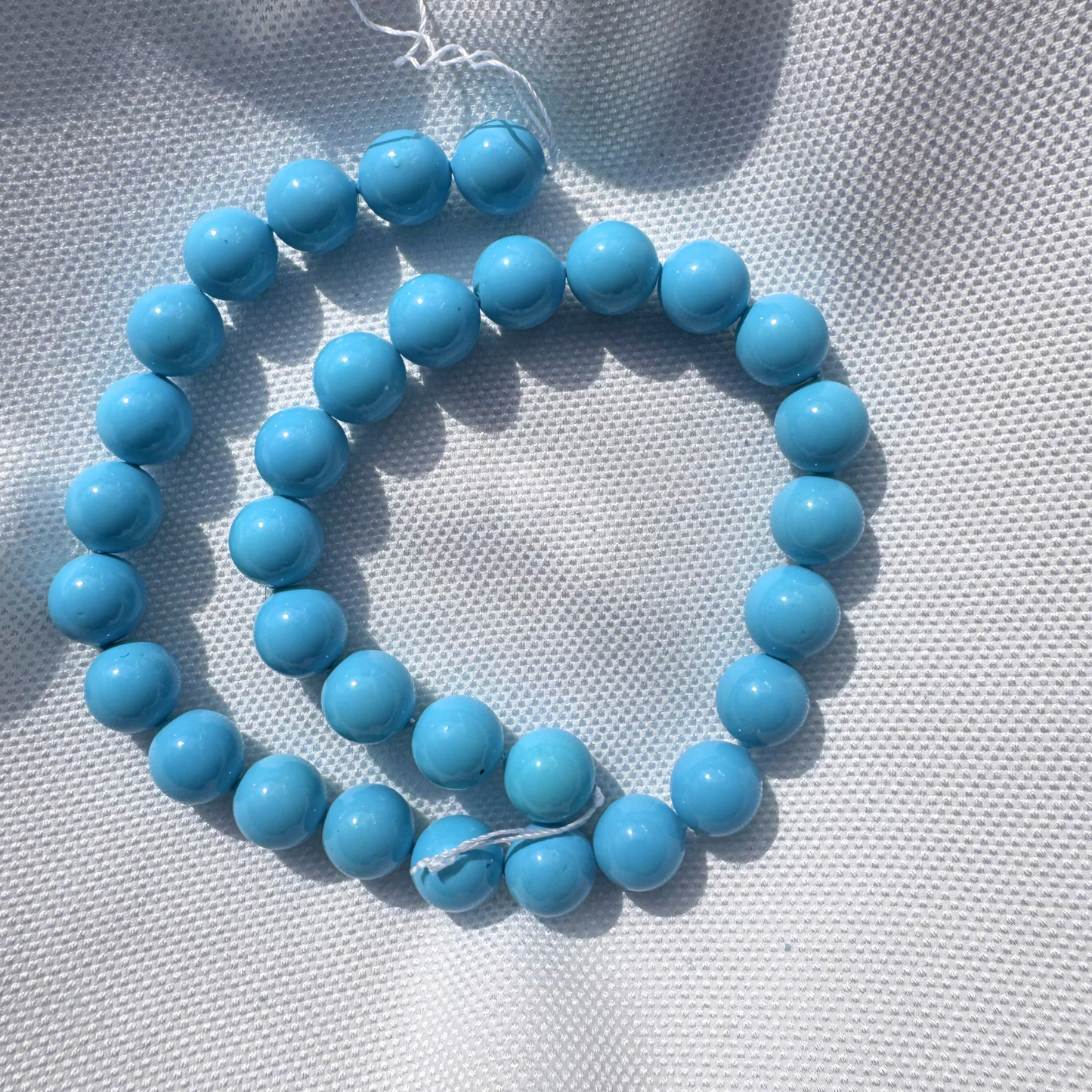 filo perle elegance turchese tonde 12 mm.