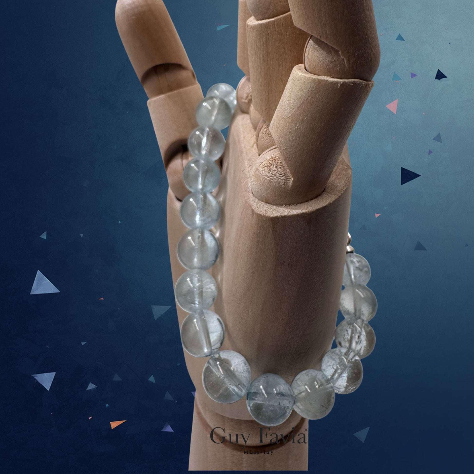 Bracciale 8 mm in Topazio Azzurro naturale, design Guy Favia.