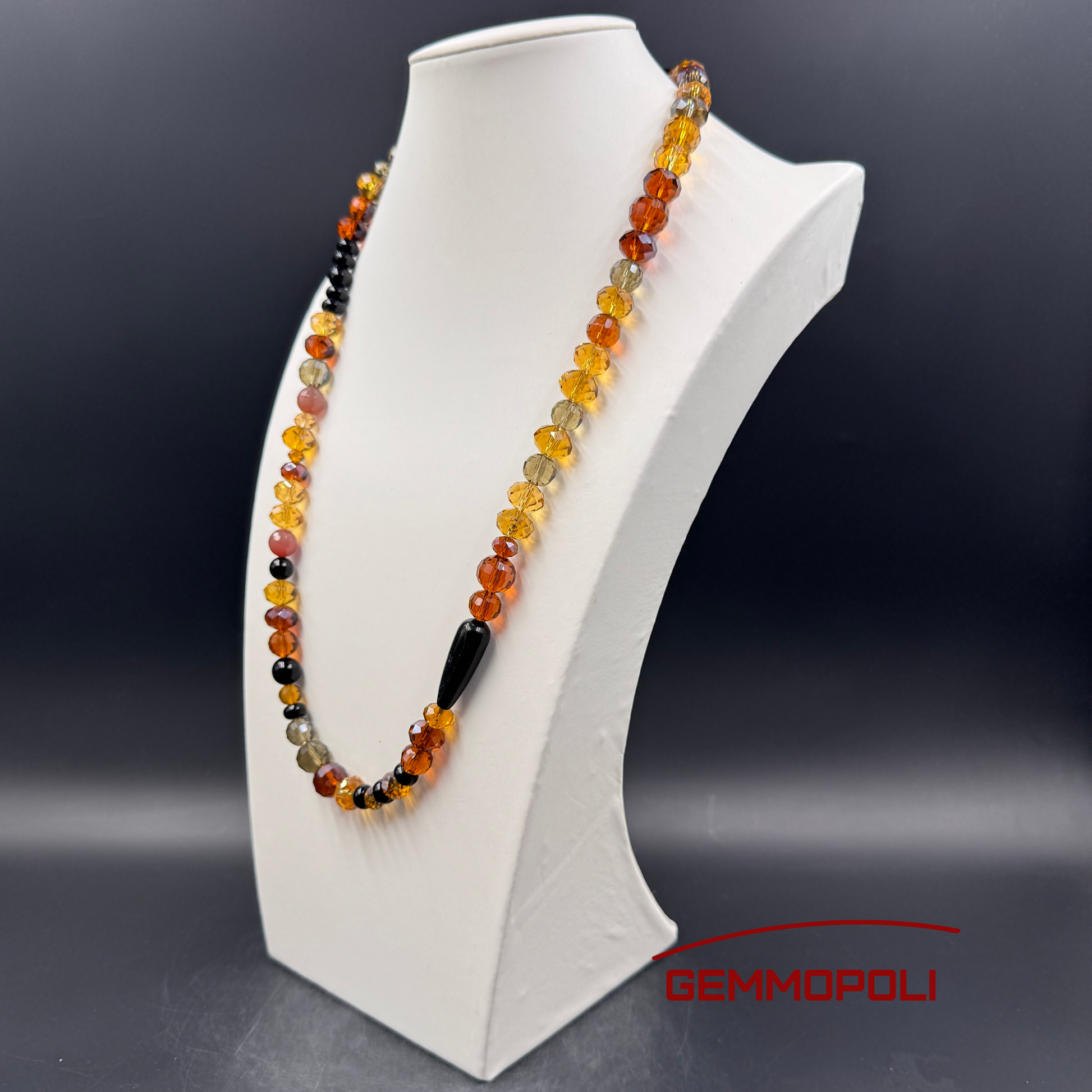 Gioiello eclettico in cristalli ambrati e pietre dure scure – Gemmopoli