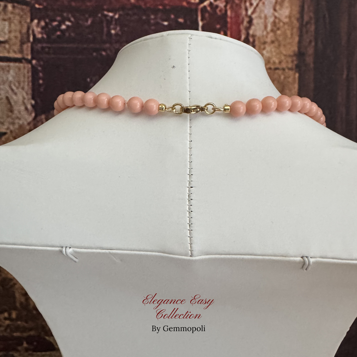 Chiusura in acciao oro della collana donna rosa con tre perle centrali bordeaux GA0058