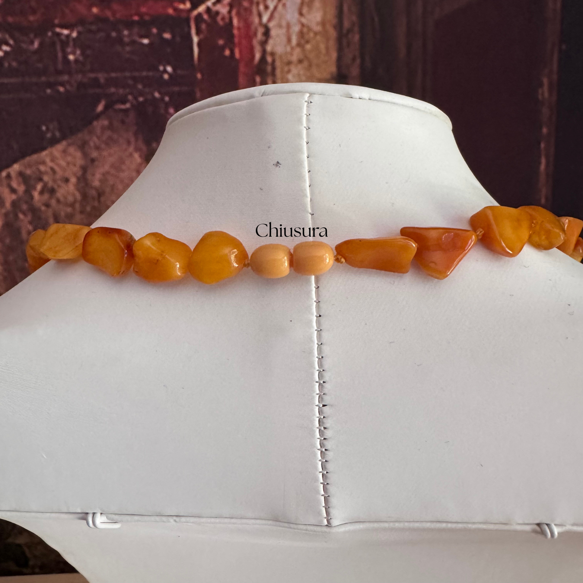 Dettaglio chiusura a vite senza metallo collana ambra GB0002