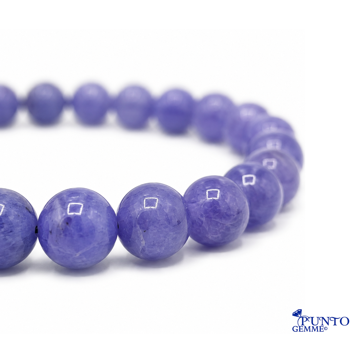 Dettaglio sfumature blu violacee Tanzanite naturale Punto Gemme MA0006