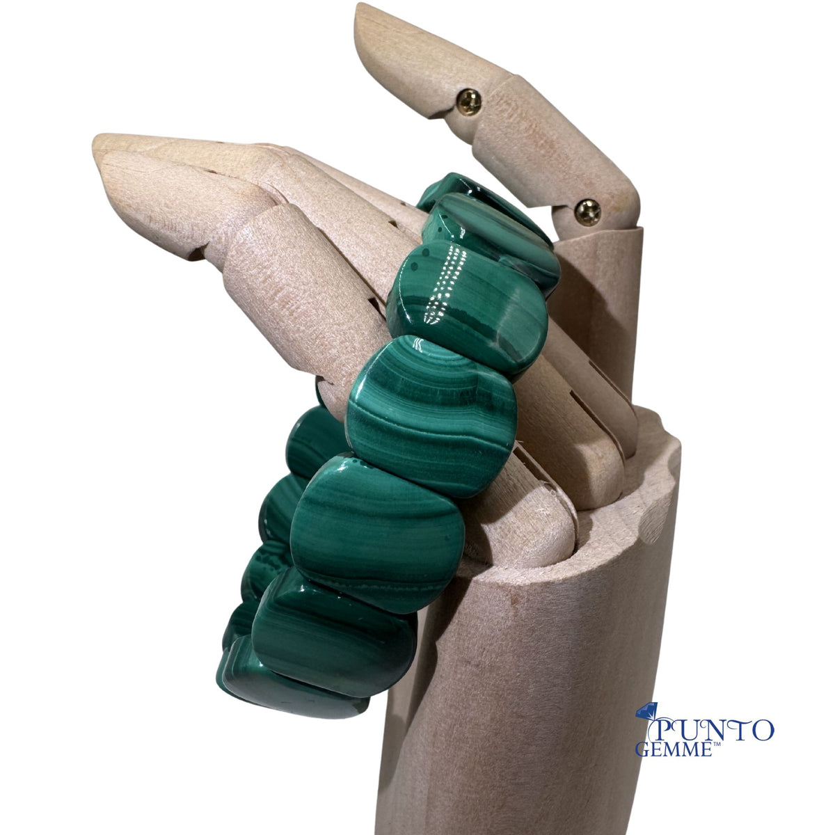 Dettaglio placchette malachite verde con venature e striature naturali.