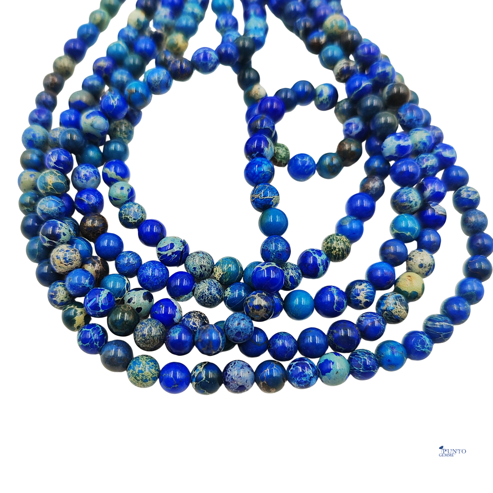 Primo piano di perle che evidenzia la finitura liscia e la miscela di blu e bianco.