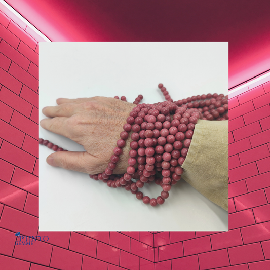 Filo di Rodonite naturale PE0460-08 con perle tonda liscia dal colore rosa intenso 