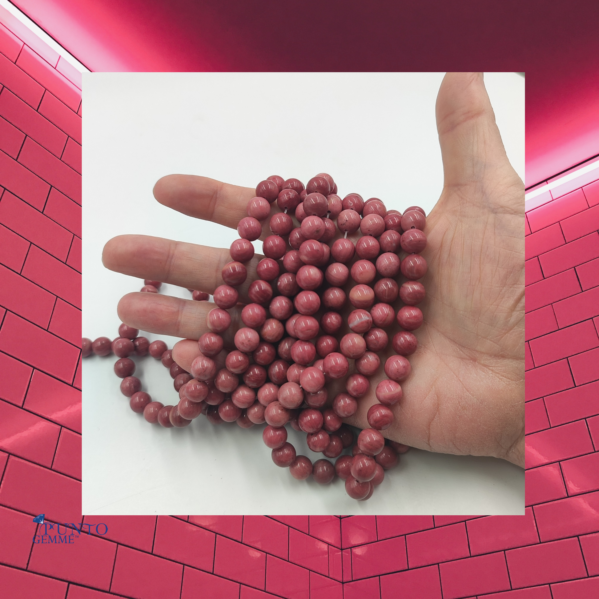 Perle sferiche di Rodonite PE0460 caratterizzate da una lucentezza naturale e tonalità rosa antico pulita.