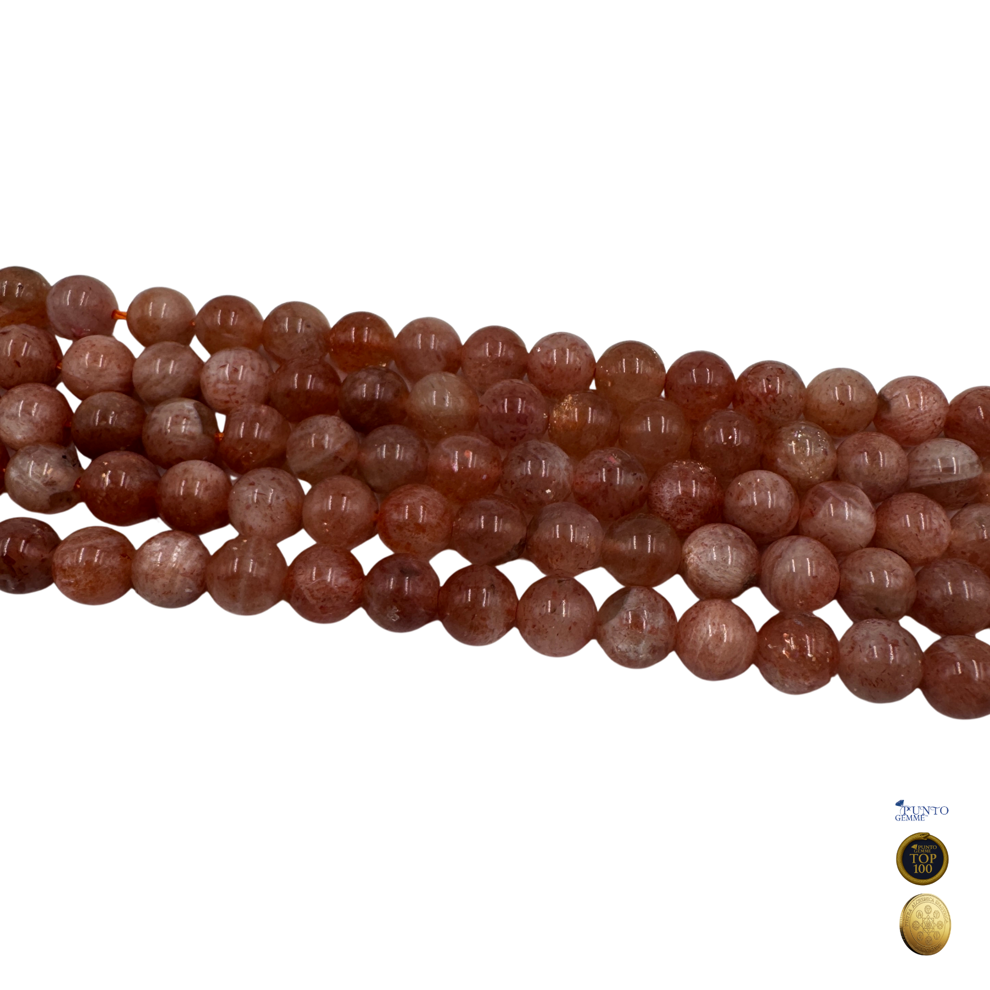 Primo piano di una singola perla di Pietra del Sole 6mm che evidenzia la finitura liscia.