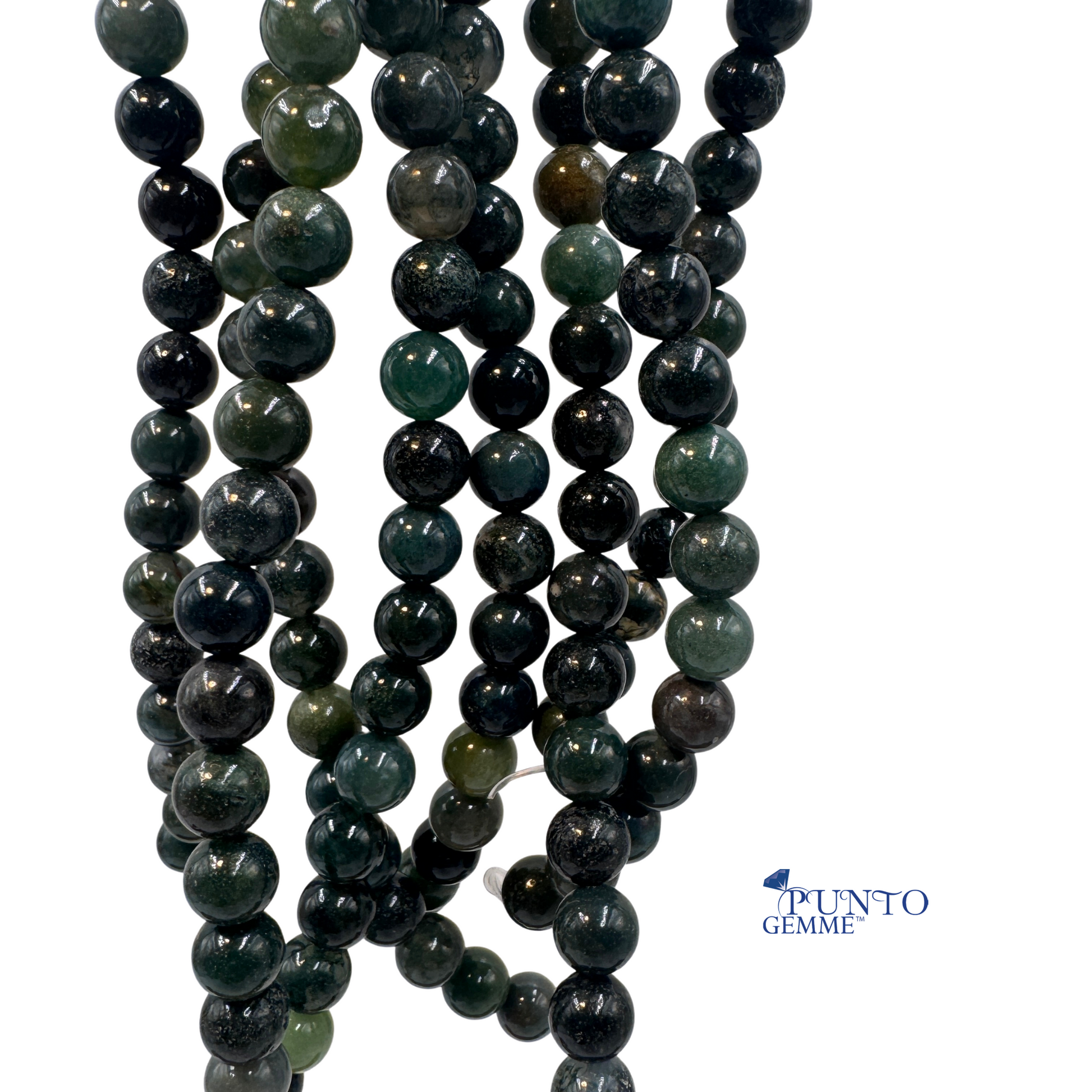 Pietra liscia di Agata Muschiata che illustra le formazioni simili al muschio.