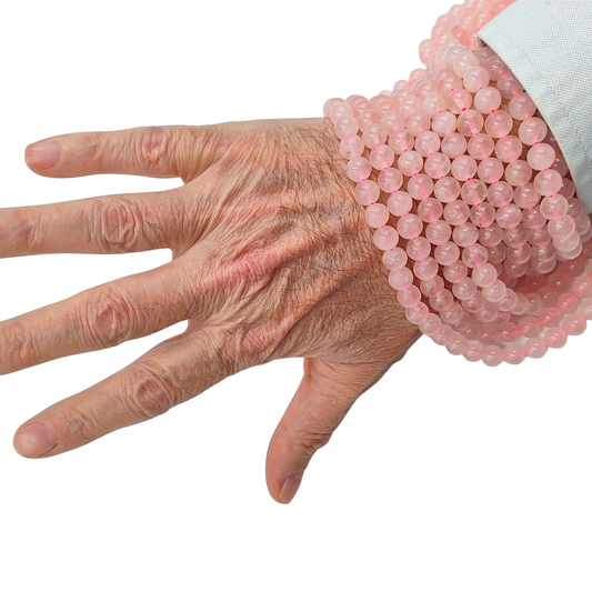 Filo di Quarzo Rosa naturale PE0792-08 con perle tonda liscia da 8 mm, tonalità rosa pastello delicata.