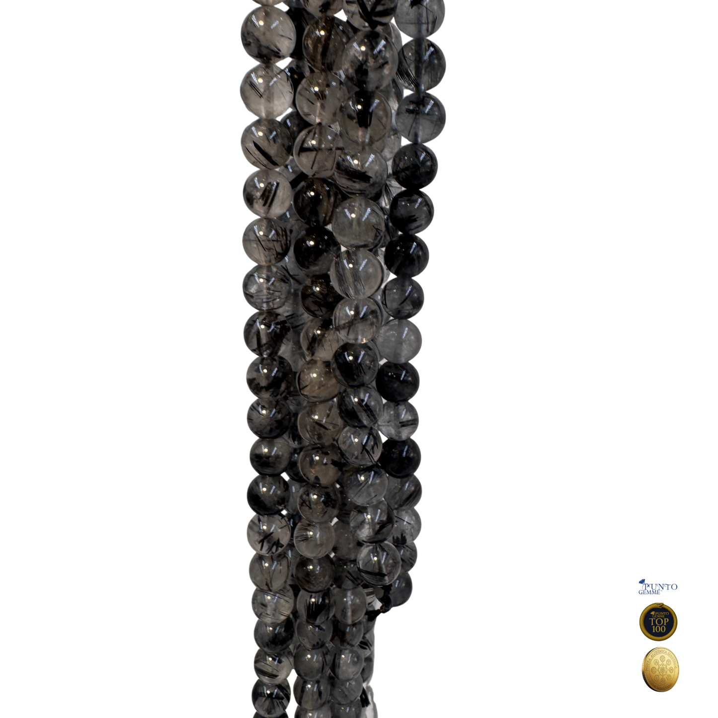 Quarzo Tormalinato posizionato in posizione della verticale spirituale.