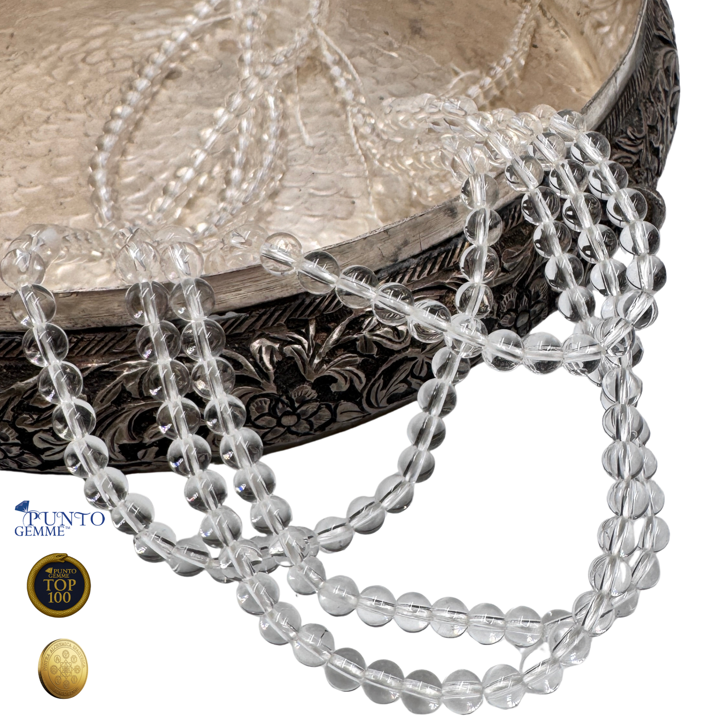 Dettaglio ravvicinato delle perle in Quarzo Ialino (PE0806-08) di 8 mm, evidenziando la qualità AA e la perfetta trasparenza.