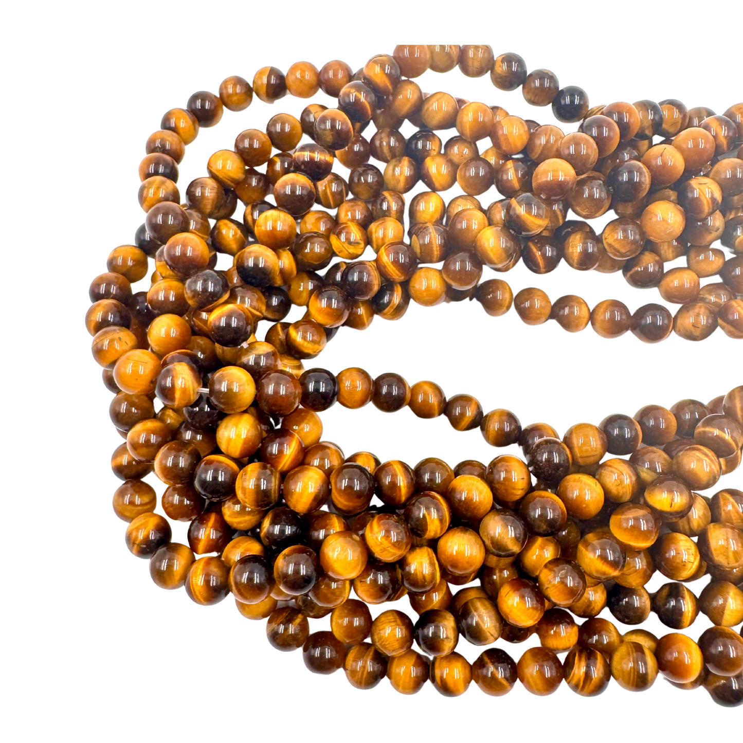 Filo di Occhio di Tigre 8mm disteso su uno sfondo scuro per enfatizzare la lucentezza dorata.