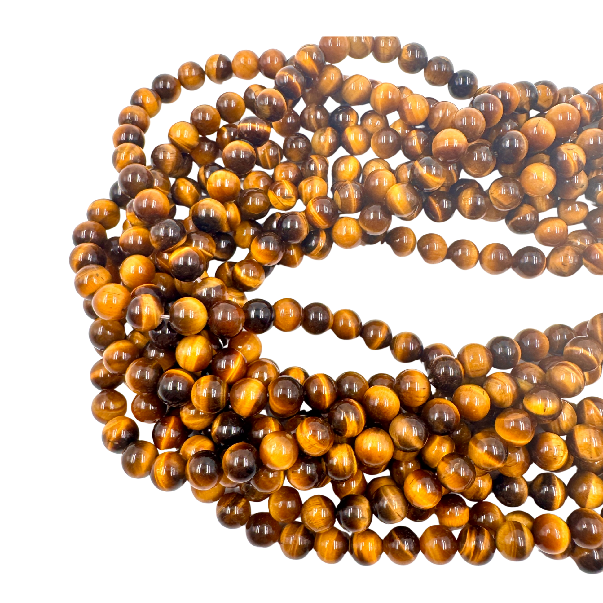 Filo di Occhio di Tigre 8mm disteso su uno sfondo scuro per enfatizzare la lucentezza dorata.