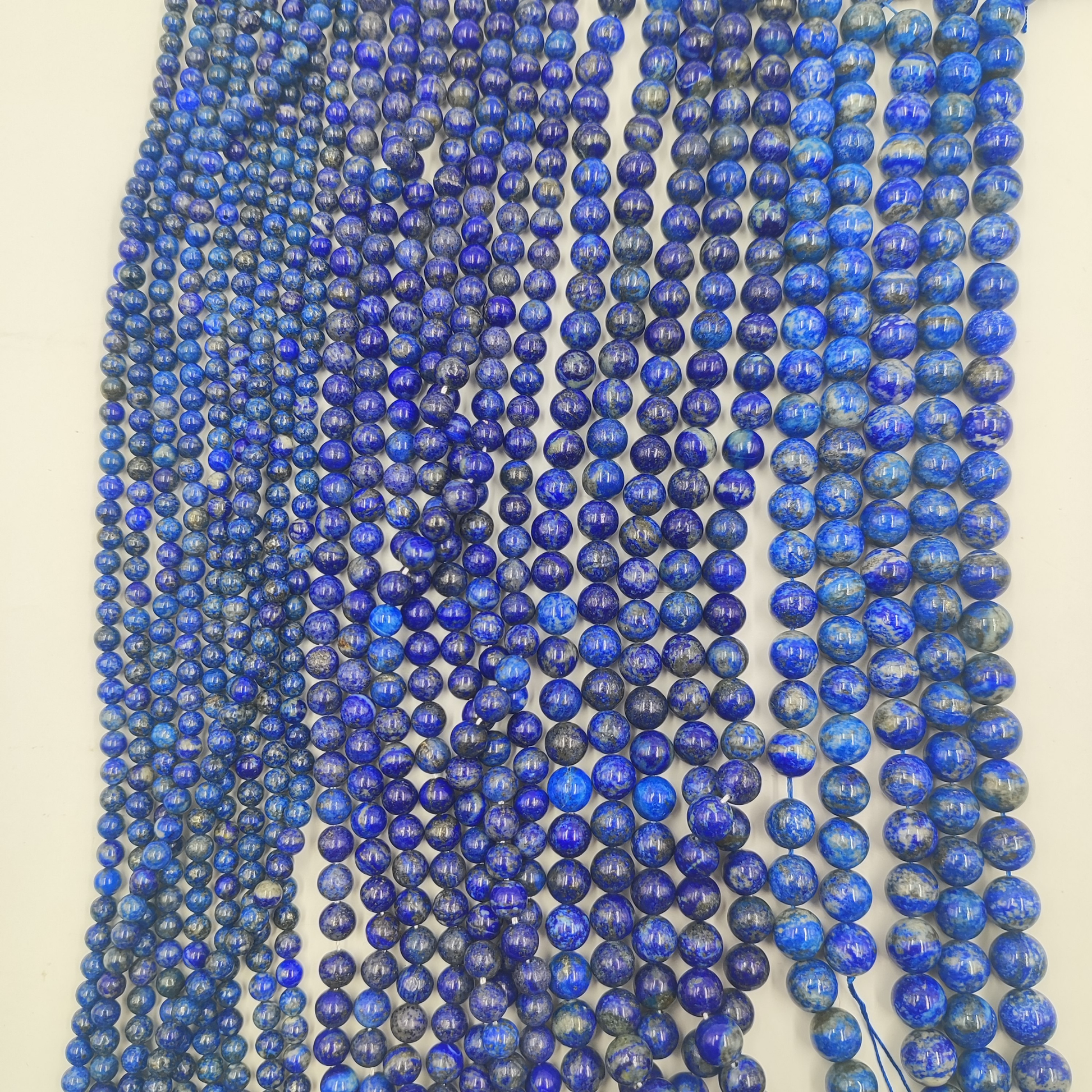 Serie completa dei quattro diametri (6, 8, 10, 12 mm) del filo di Lapislazzuli naturale linea Pietra Aurea.