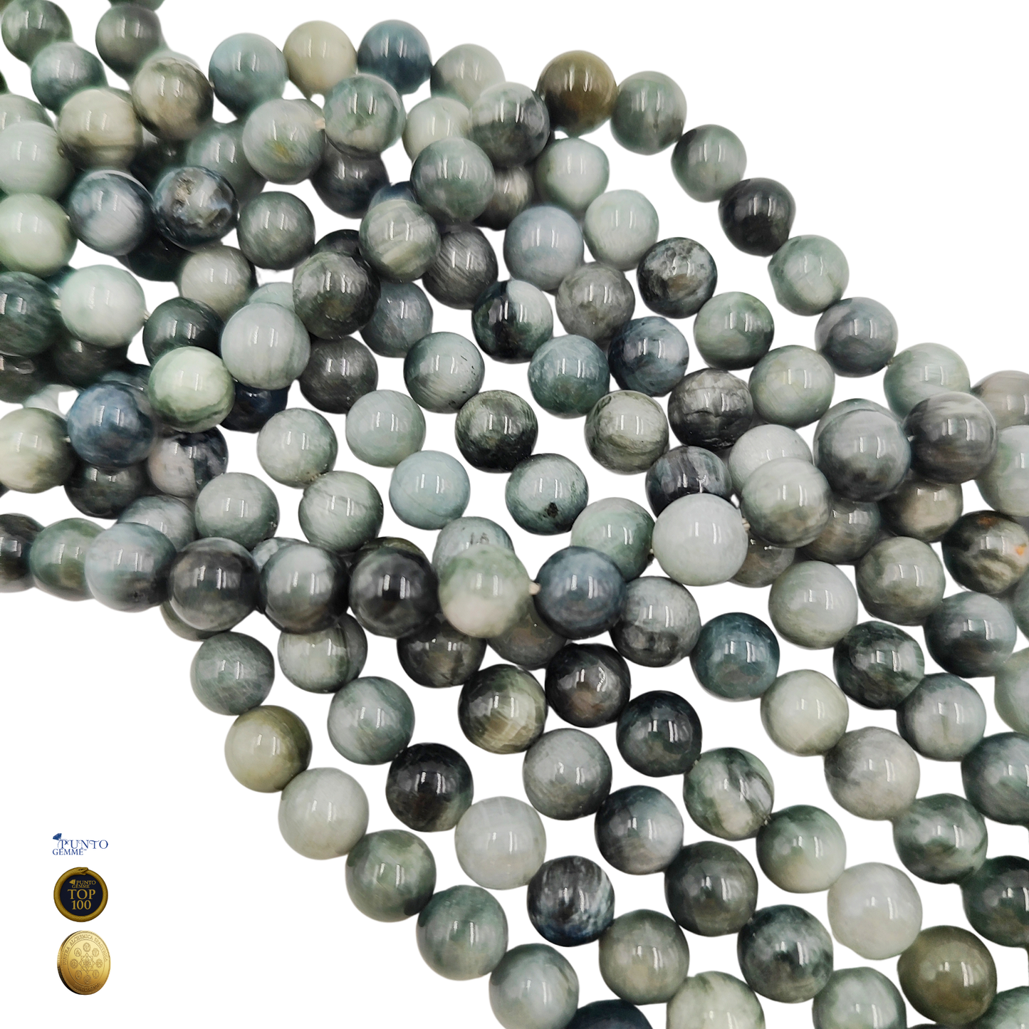 Dettaglio macro di una perla di Occhio d'Aquila 8mm che evidenzia il colore grigio scuro e il riflesso sericeo (chatoyance).