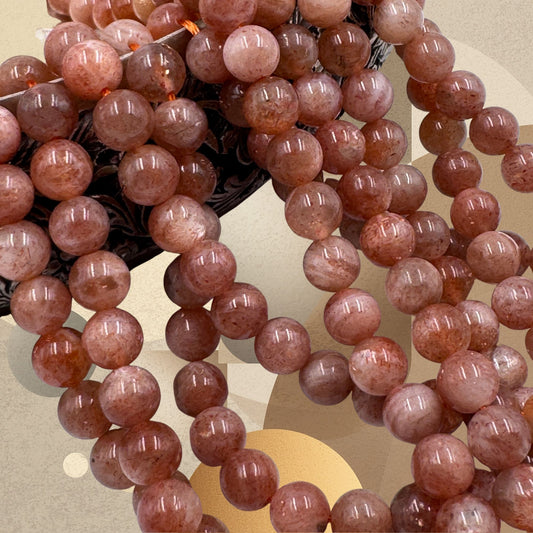 Pietra del Sole naturale 6mm perle tonde lisce dettaglio riflessi dorati.