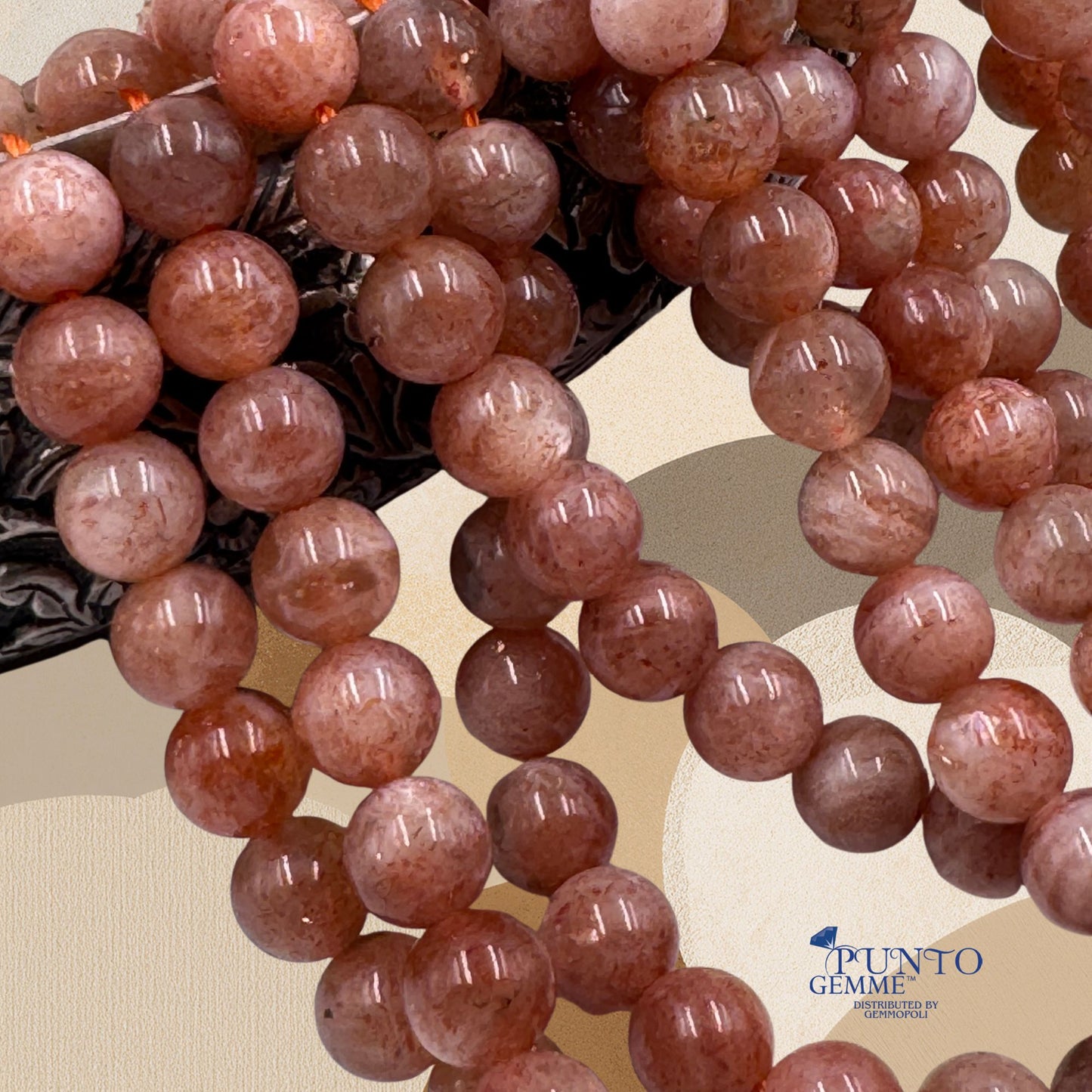 Sunstone  Punto Gemme PE0955-06 mostra tonalità arancio caldo.