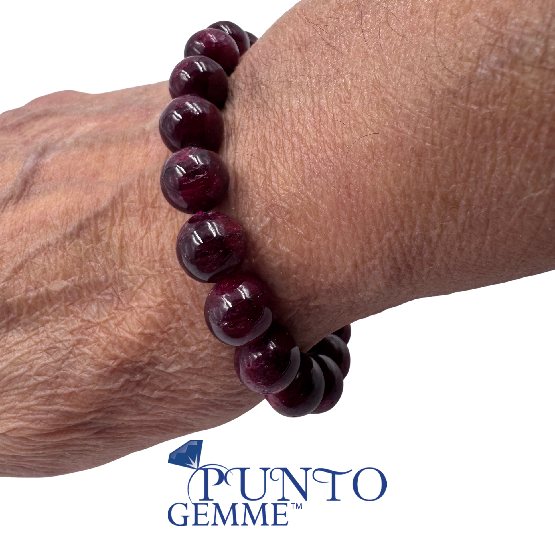 Presentazione del bracciale Rubino Birmania Sangue di Piccione, eccellenza da collezione con perle da 10 mm.
