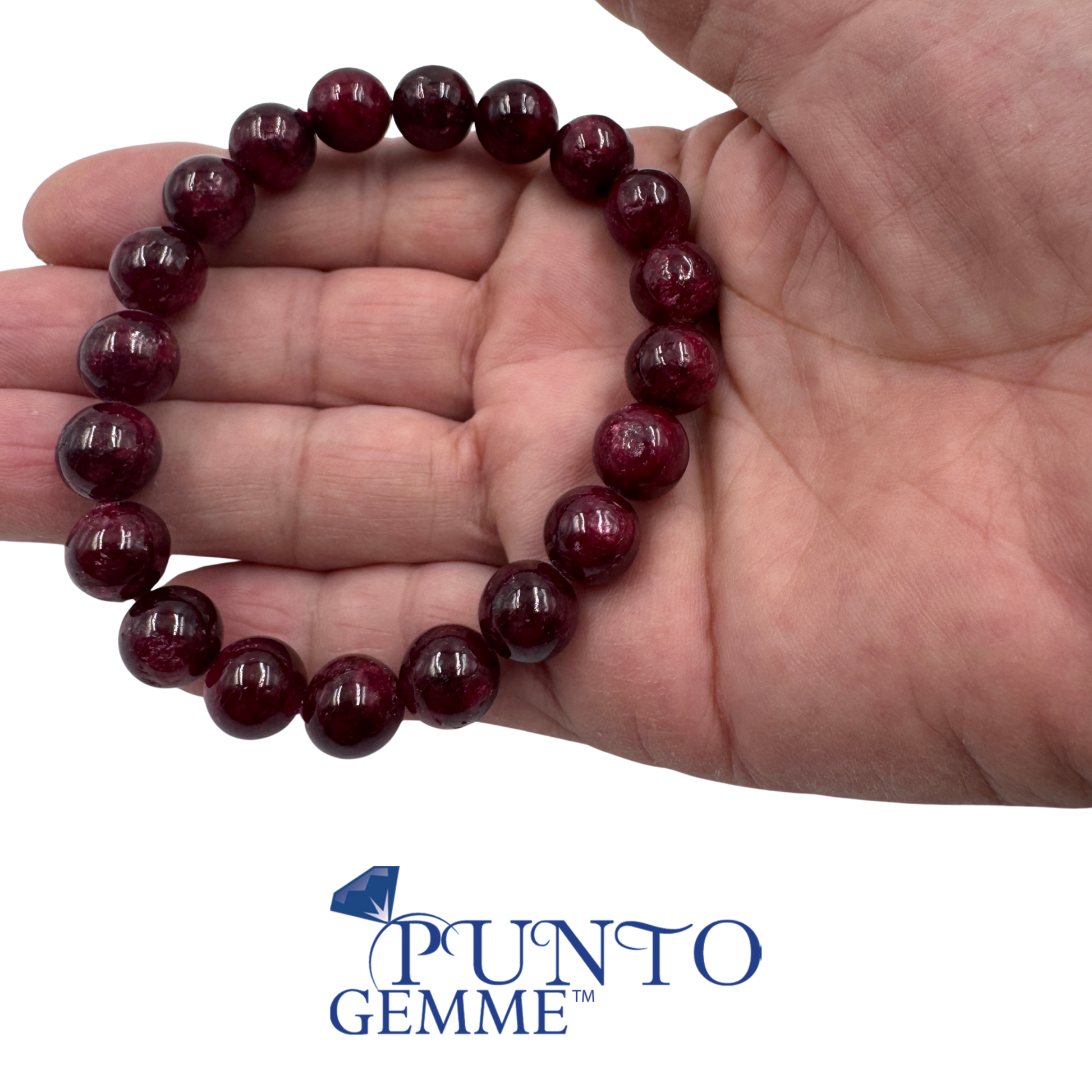Bracciale in Rubino Birmania naturale 10 mm calibrato PE6008-10, appoggiato sulla mano