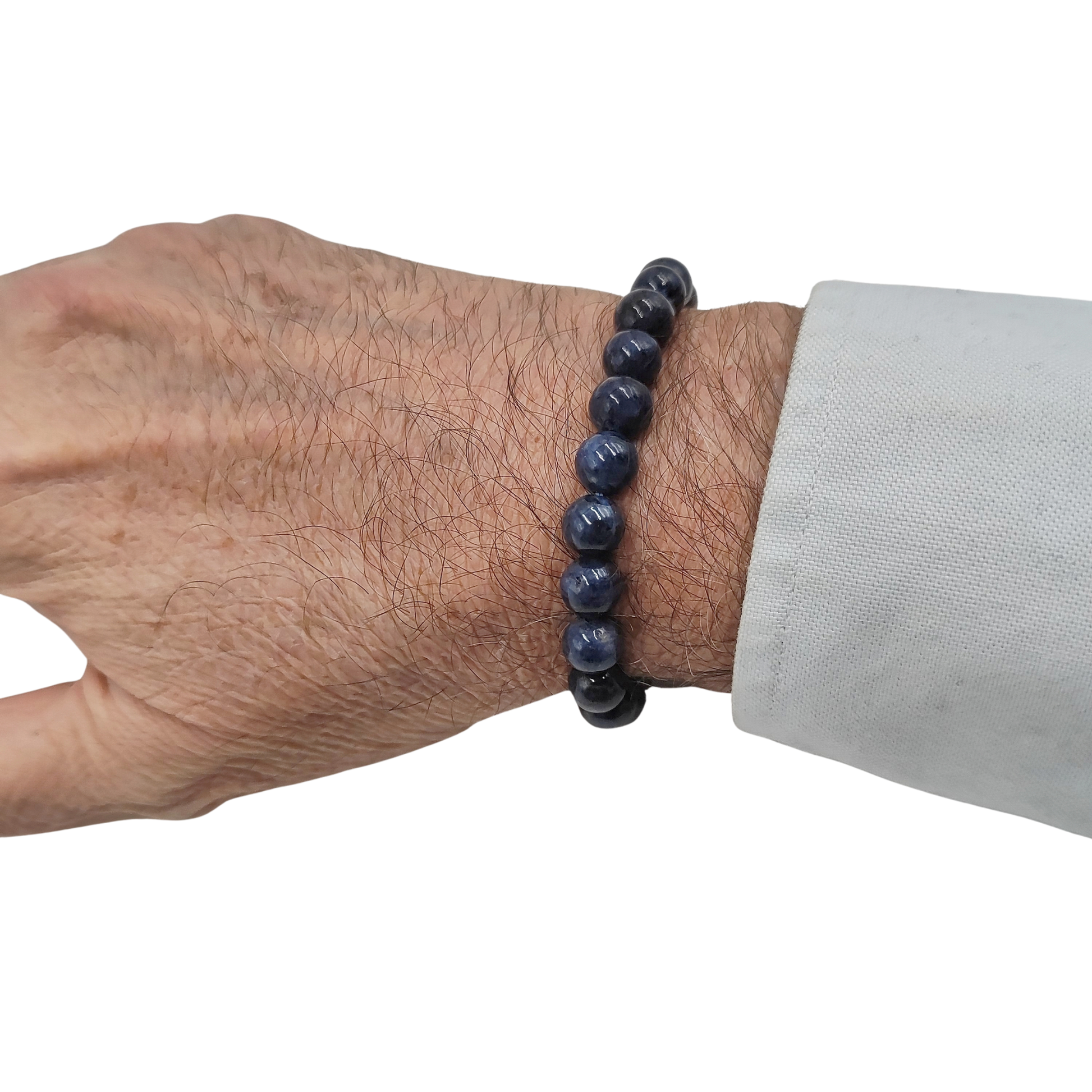 Dettaglio della finitura lucida delle perle calibrate di Zaffiro Birmania Grado AAA, eccellenza Punto Gemme.