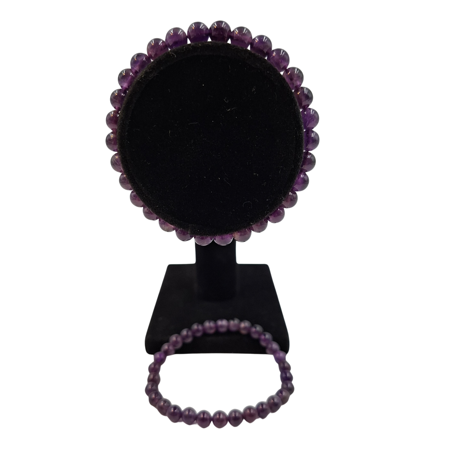 Dettaglio ravvicinato delle perle di Ametista 6mm, che mostrano le variazioni naturali del viola.