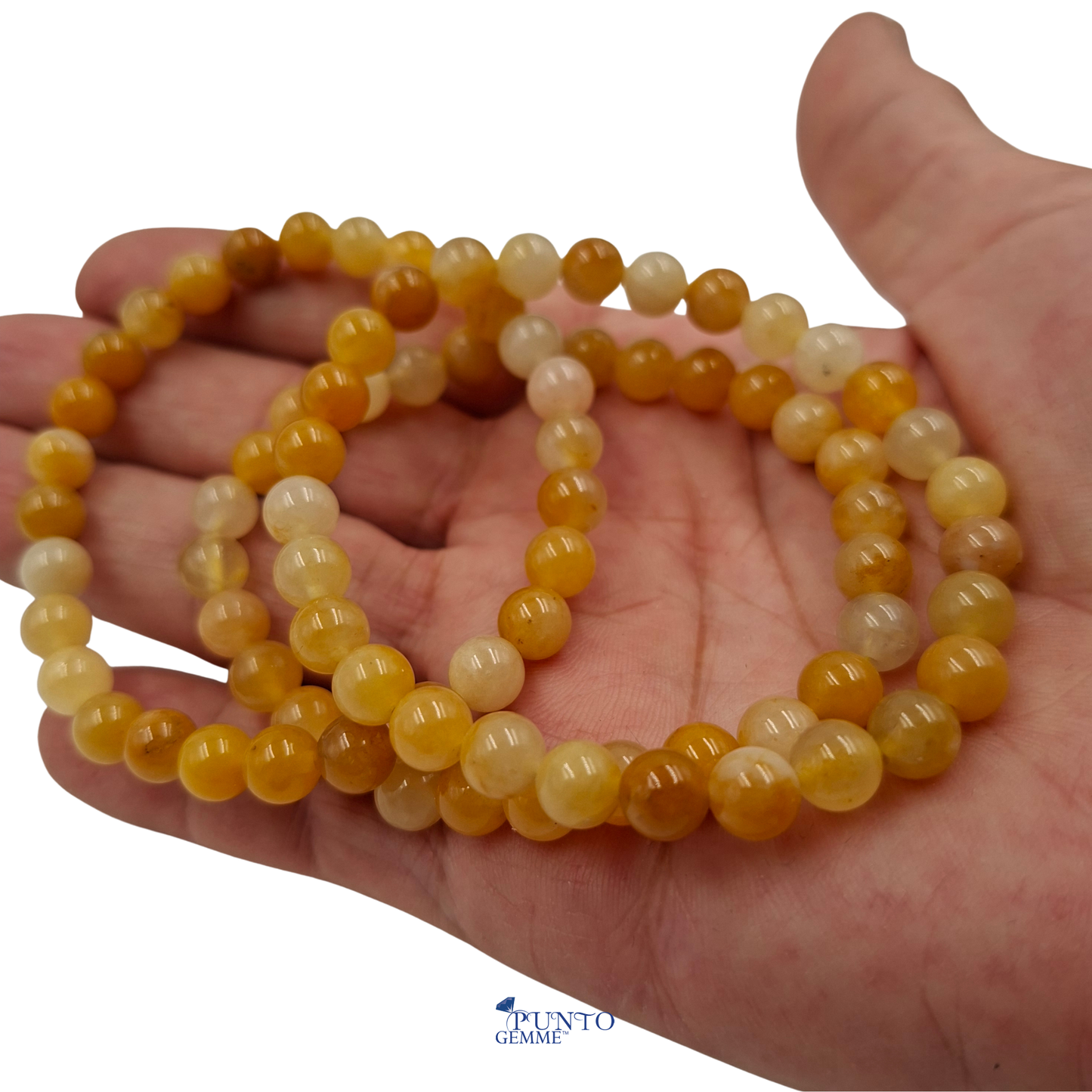 Bracciale elastico in Avventurina Gialla Tonda Liscia , che mostra la sua tonalità solare.