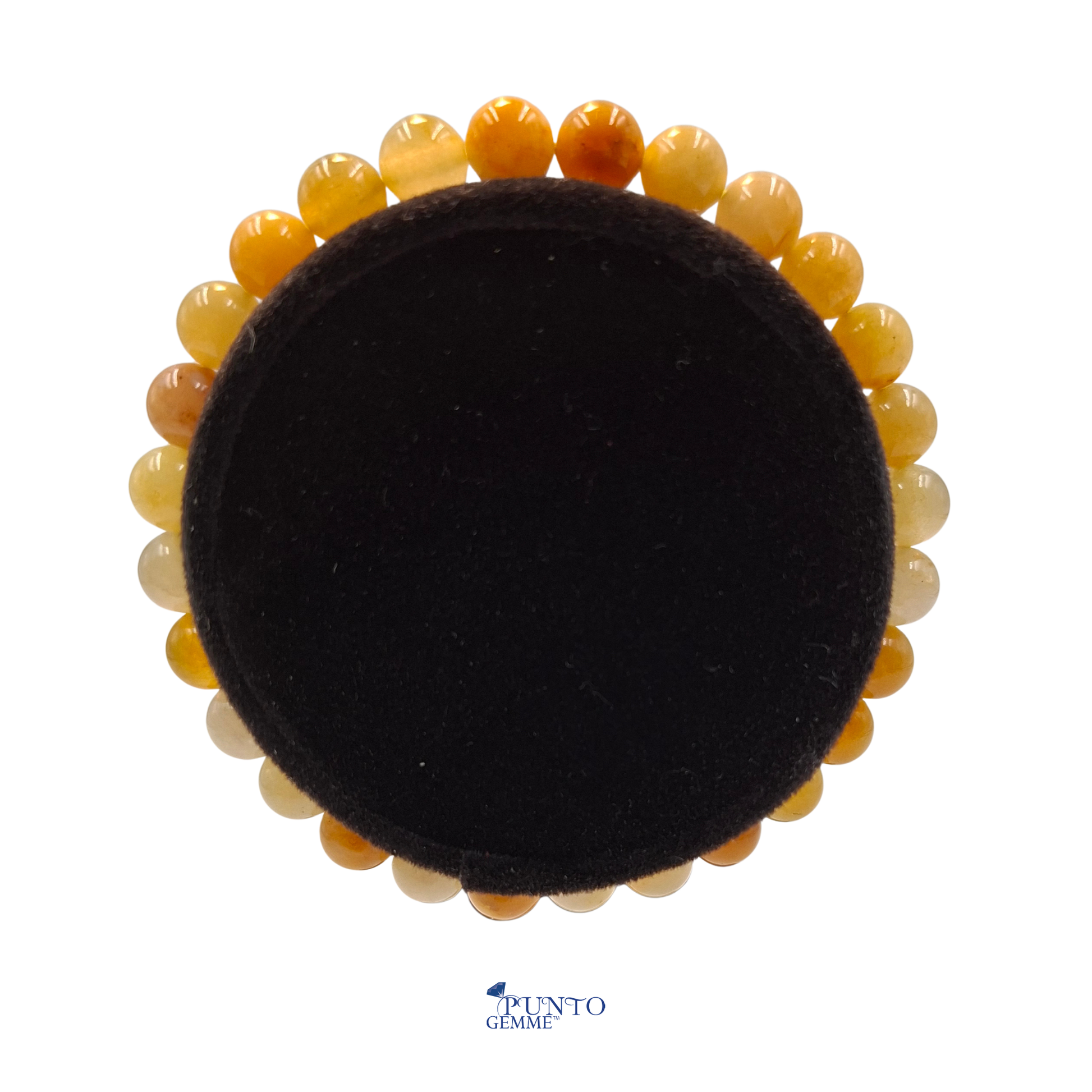 Il bracciale fotografato in un contesto luminoso che esalta il suo legame con il sole e l'ottimismo.