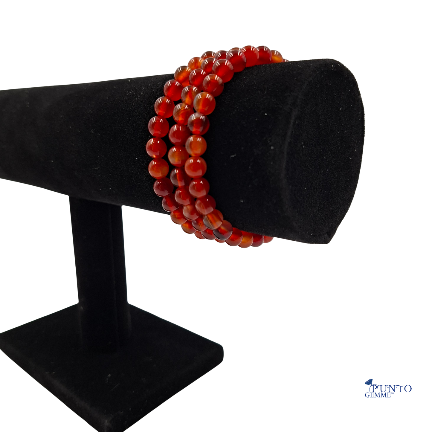 Il bracciale Agata Rossa fotografato per enfatizzare il suo legame con la forza e l'energia vitale.