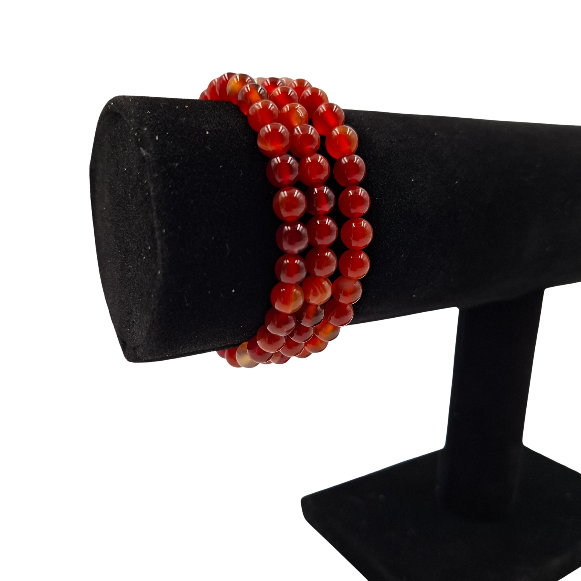 Bracciale elastico in Agata Rossa Tonda Liscia , che mostra il colore rosso intenso.