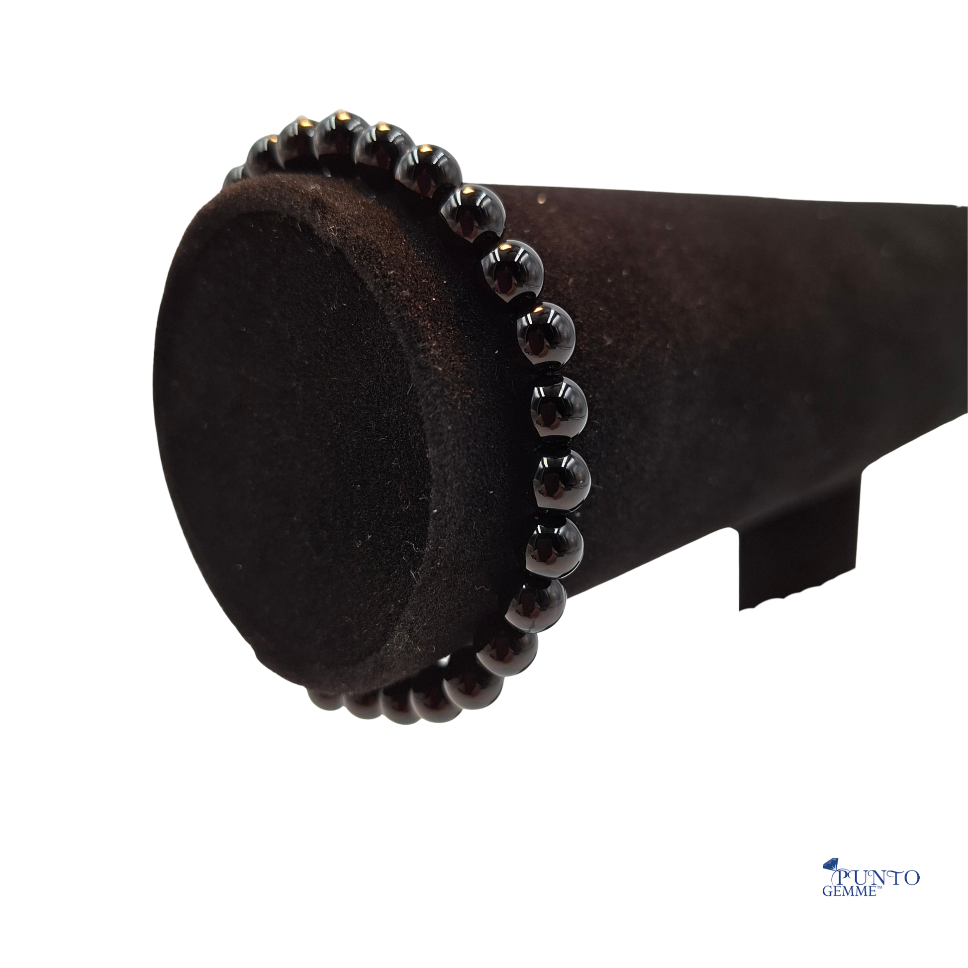 Scatto del bracciale elastico Agata Nera arrotolato su espositore. Punto Gemme