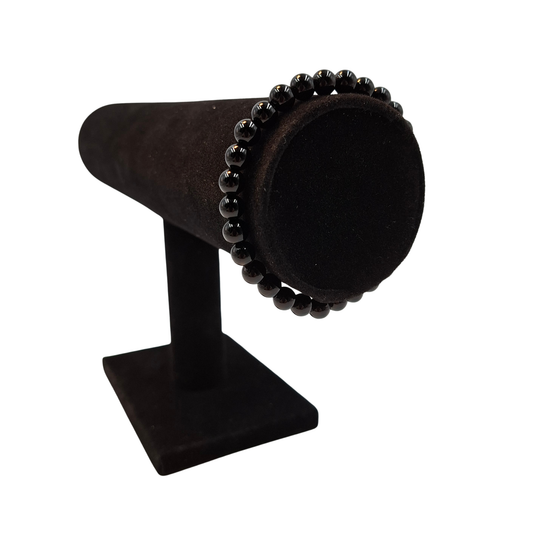Bracciale elastico in Agata Nera 6mm, che mostra il colore nero lucido e uniforme.