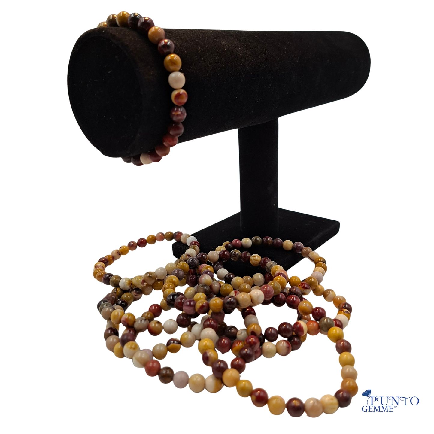 Scatto di bracciali elastico Mookaite arrotolato, che ne mostrano la compattezza e la lucentezza.