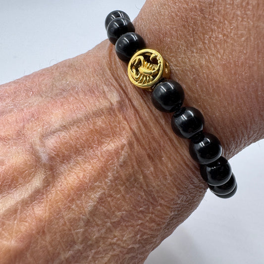 Bracciale Zodiaco Scorpione PE8036 in Tormalina Nera Certificata, indossato al polso.