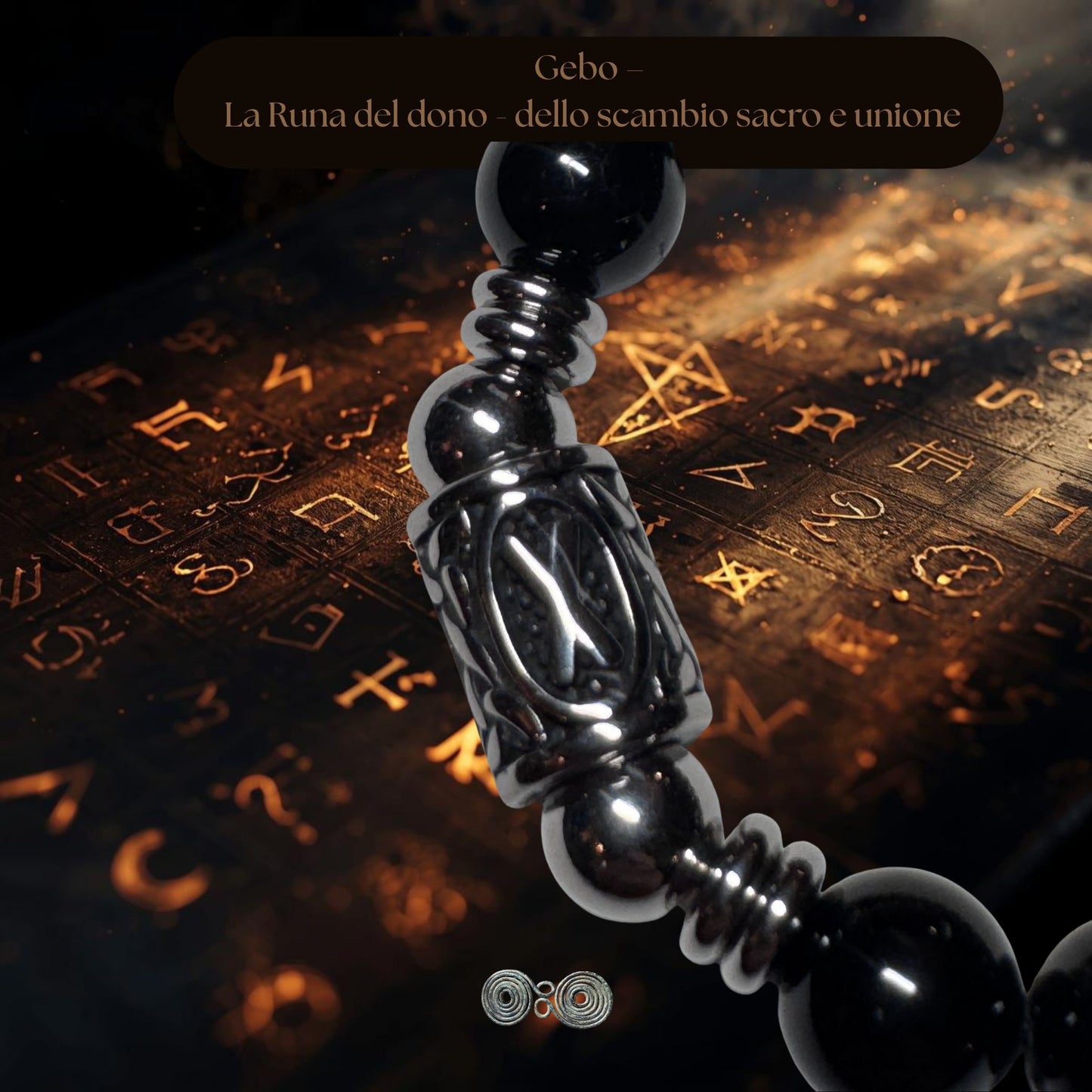 Primo piano incisione Runa Gebo (X) su acciaio inox e pietra nera naturale.