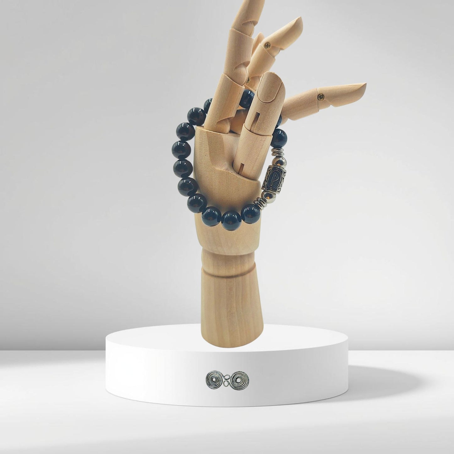 perle di tormalina nera 10mm lotto certificato, dettaglio finitura e montatura.