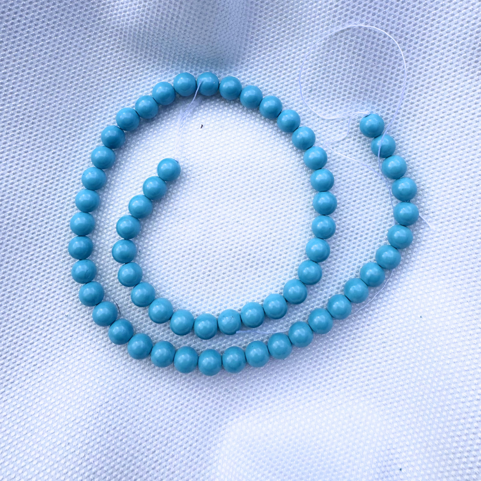 filo perle elegance turchese tonde 6 mm.