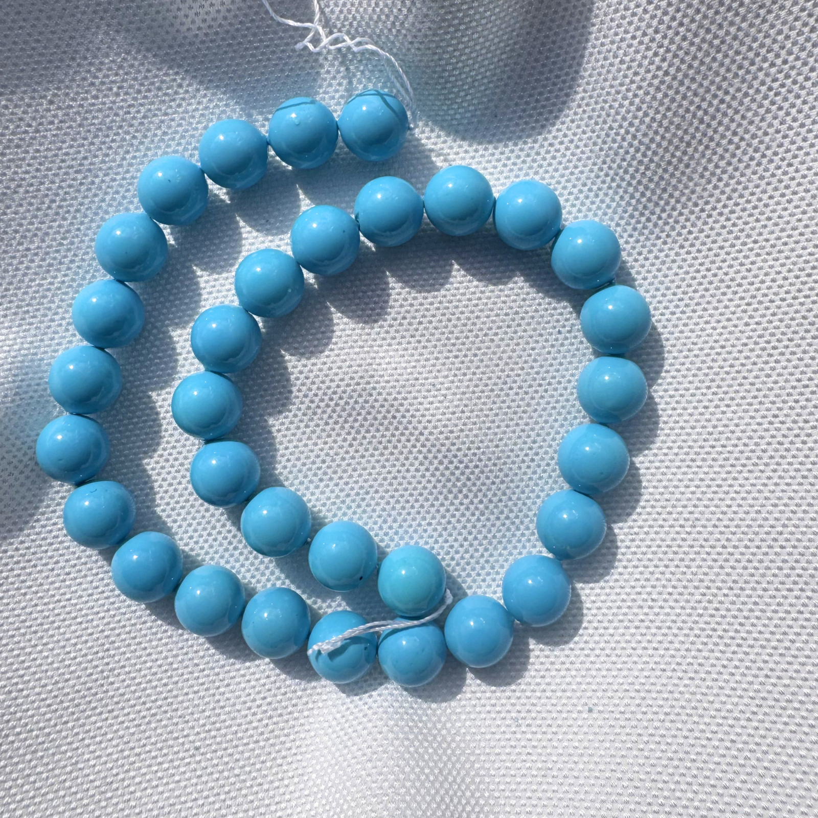 filo perle elegance turchese tonde 12 mm.